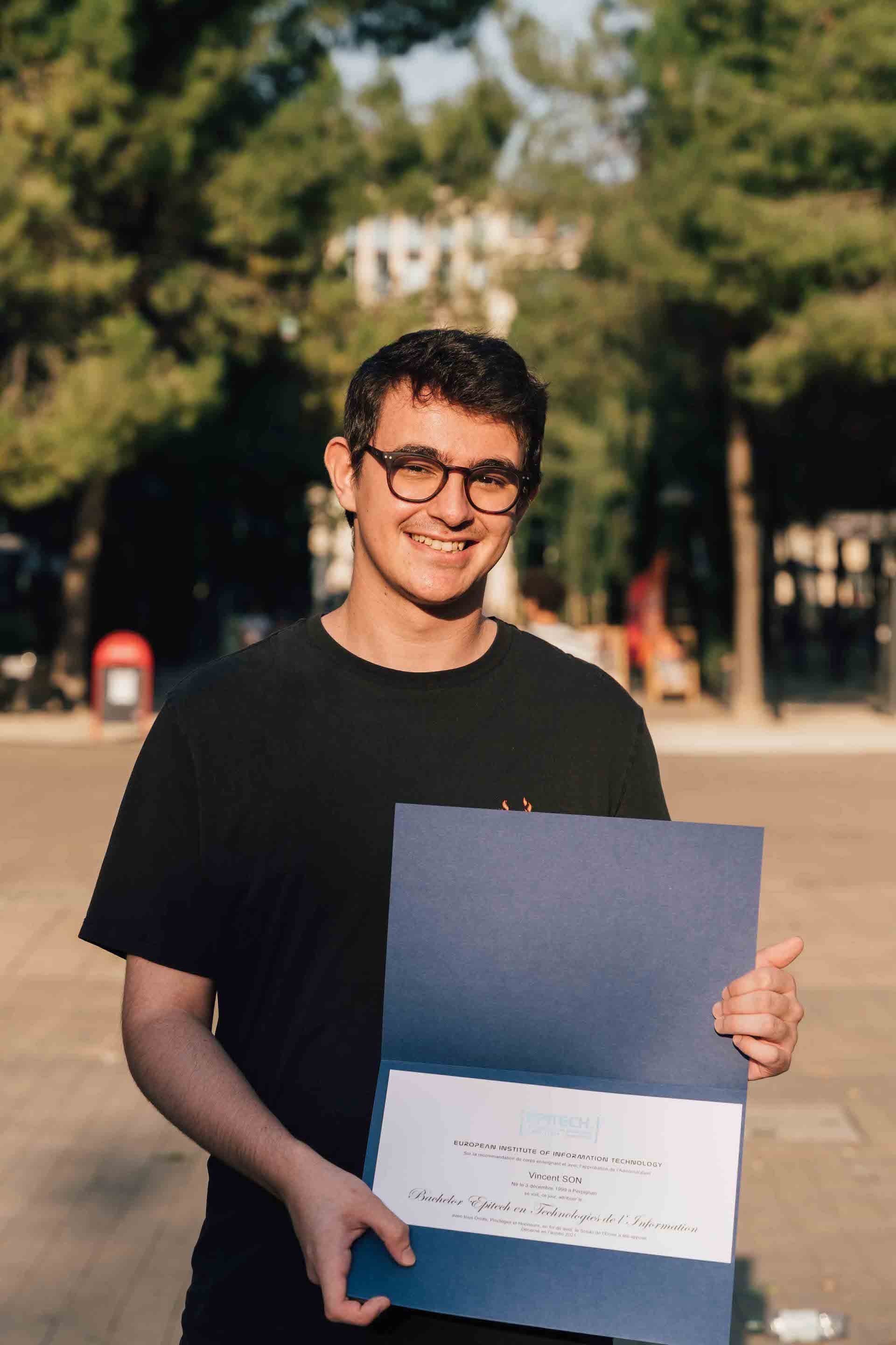 its me holding my degree